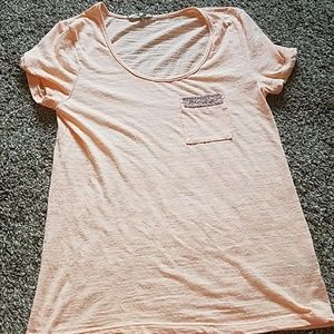 Buckle embellished pocket top